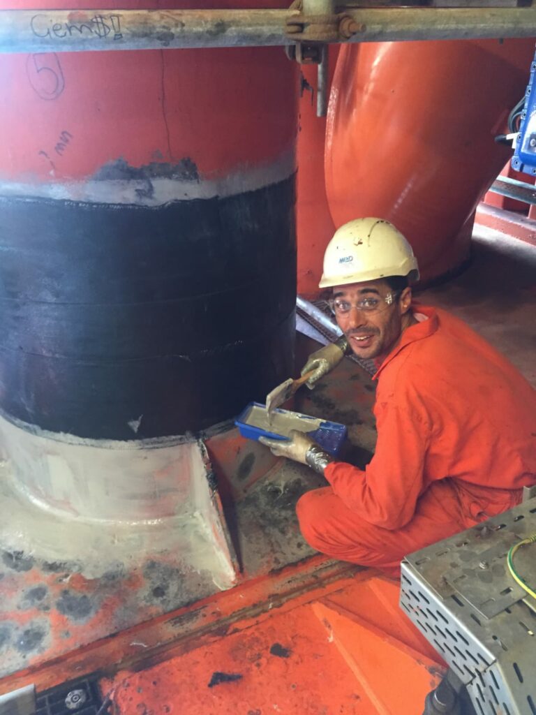 Applying composite repair to a corroded industrial vessel